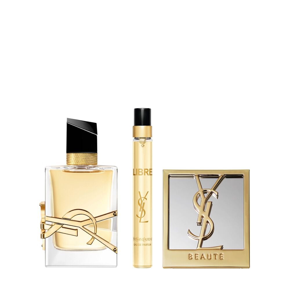 Libre Eau de Parfum 50 ml bottle beside a 10 ml travel spray and a compact mirror on a white background.
