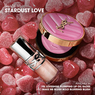 YSL Make Me Blush Powder Blush and LOVESHINE Plumping Lip Oil Gloss in shade 10, nestled among pink heart-shaped candie