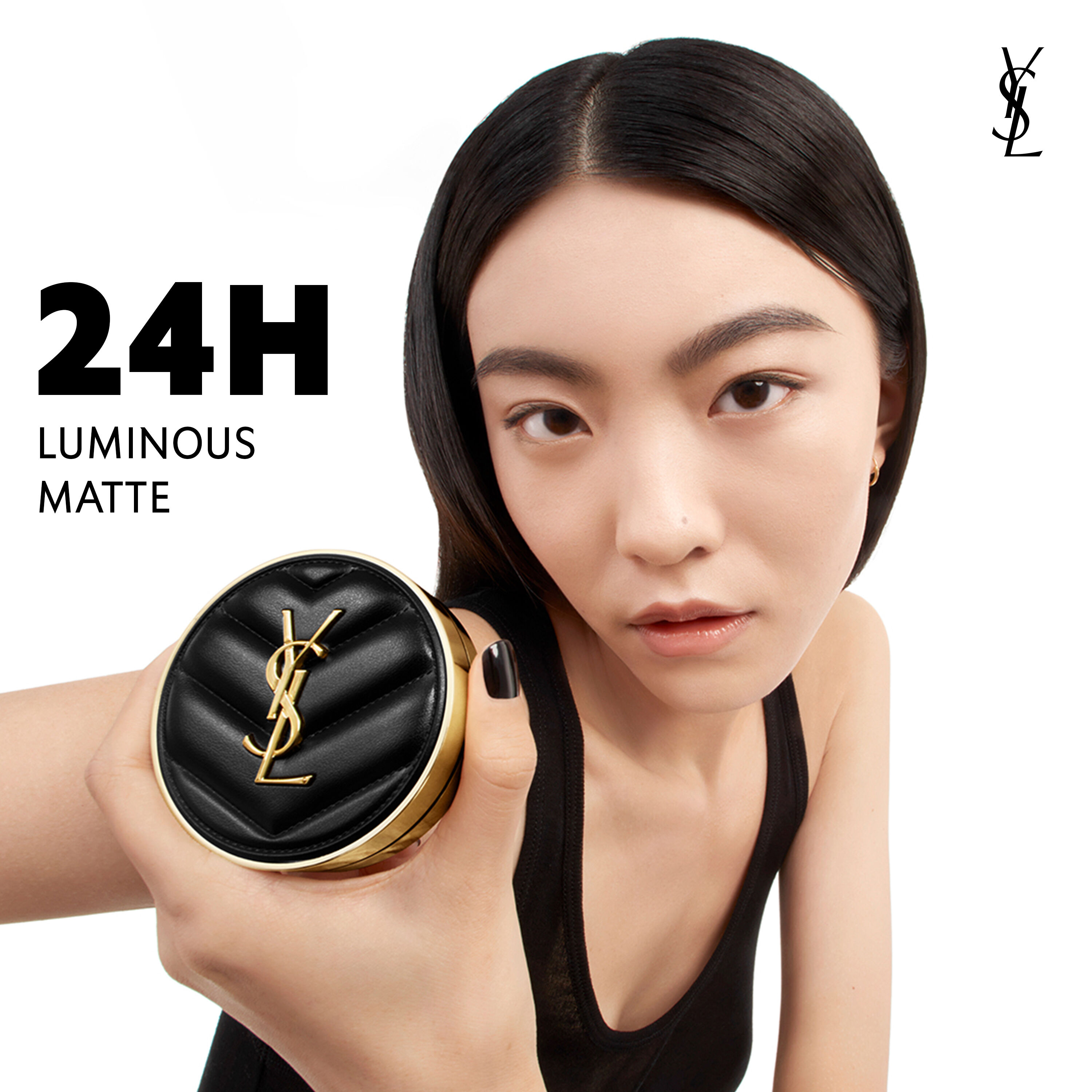 Model holding YSL Le Cushion Encre de Peau cushion foundation highlighting its 24-hour luminous matte finish