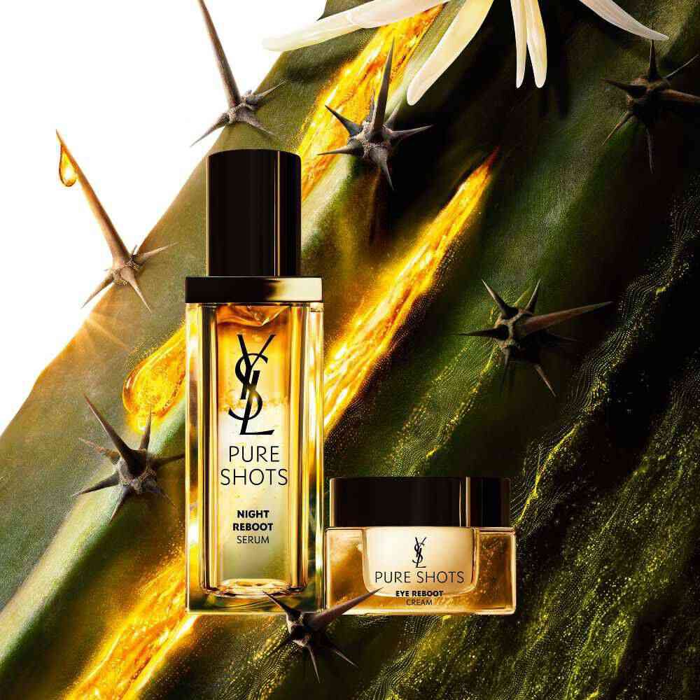 YSL Pure Shots duo: Night Reboot Serum and Eye Reboot Cream, set against the iconic Moonlight Cactus.