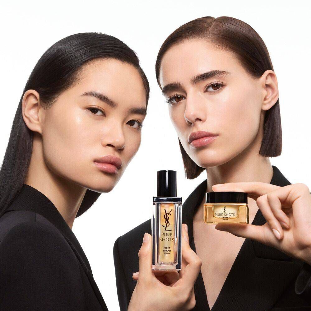 Elyssa and Mingma, YSL Beauty models, holding YSL Pure Shots Eye Reboot Cream and Night Reboot Serum.