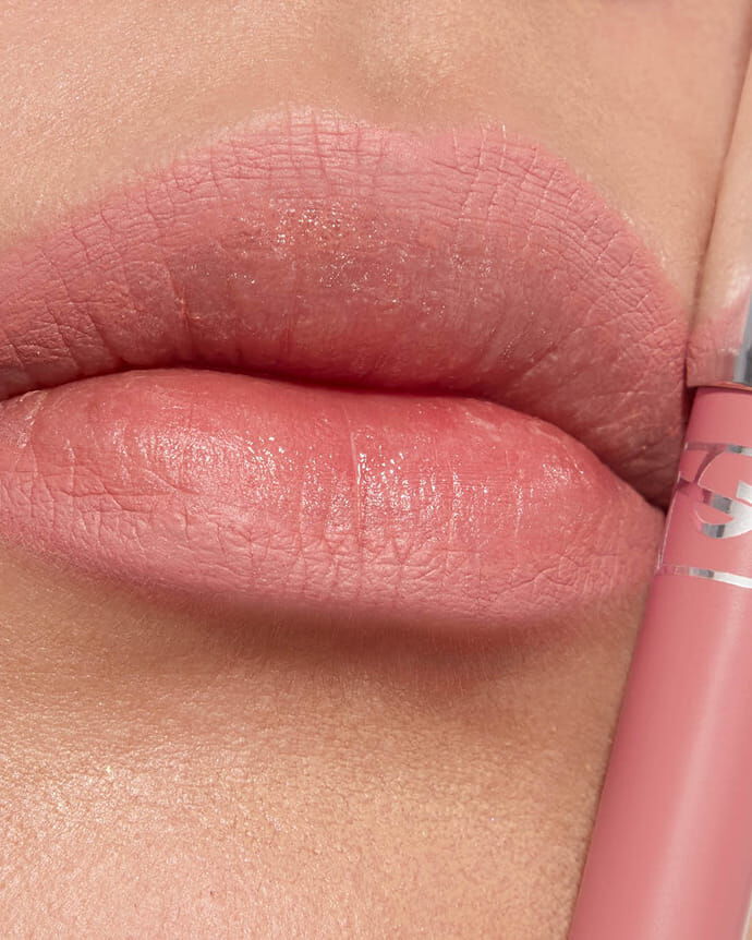 Jia Lu Yi wearing YSL LOVENUDE Kiss Shaper, shade 44, on light skin. Portrait close-up.