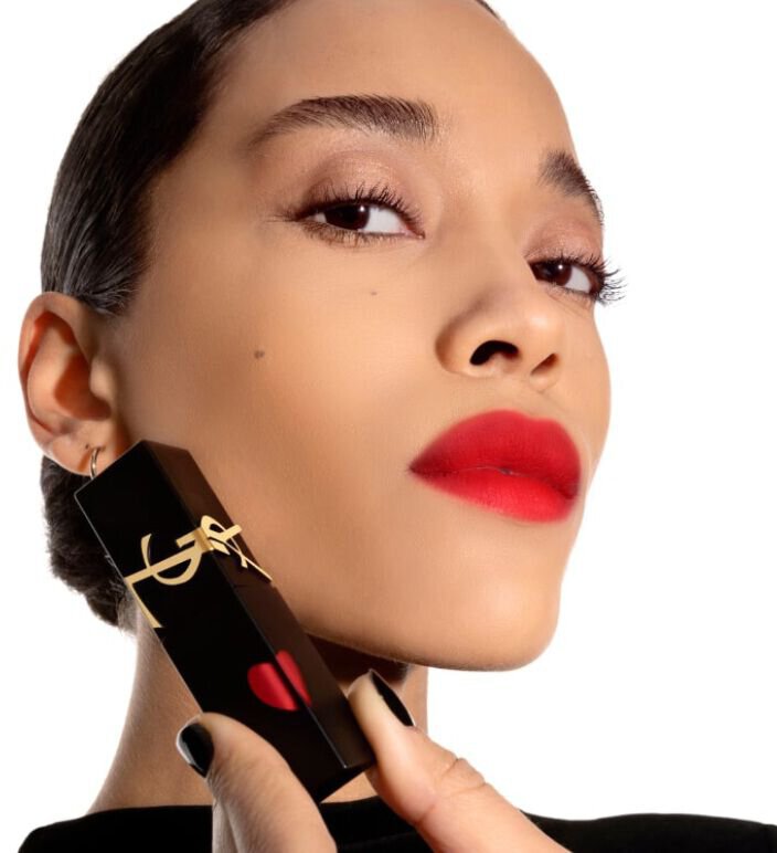 Close-up of model highlighting YSL matte lipstick shade 201 Red Invitation