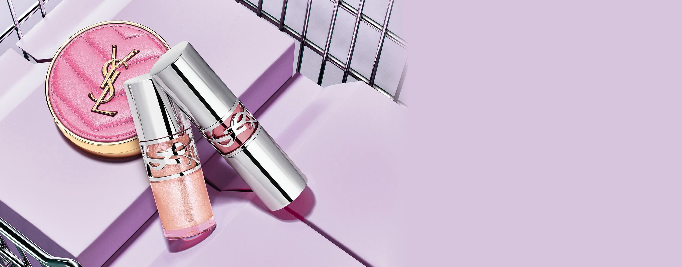 YSL Loveshine Plumping Lip Oil Gloss, Loveshine Lipstick, and Make
Me Blush compact, all shade 10, in a shopping basket.