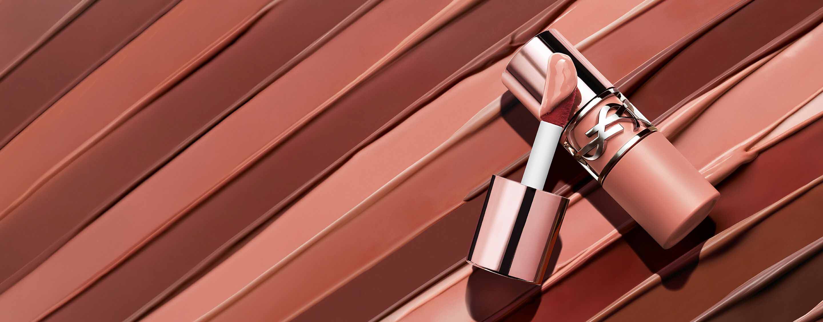 YSL LOVENUDE LIP STAIN on texture

smear showing the weightless serum-in-
stain.