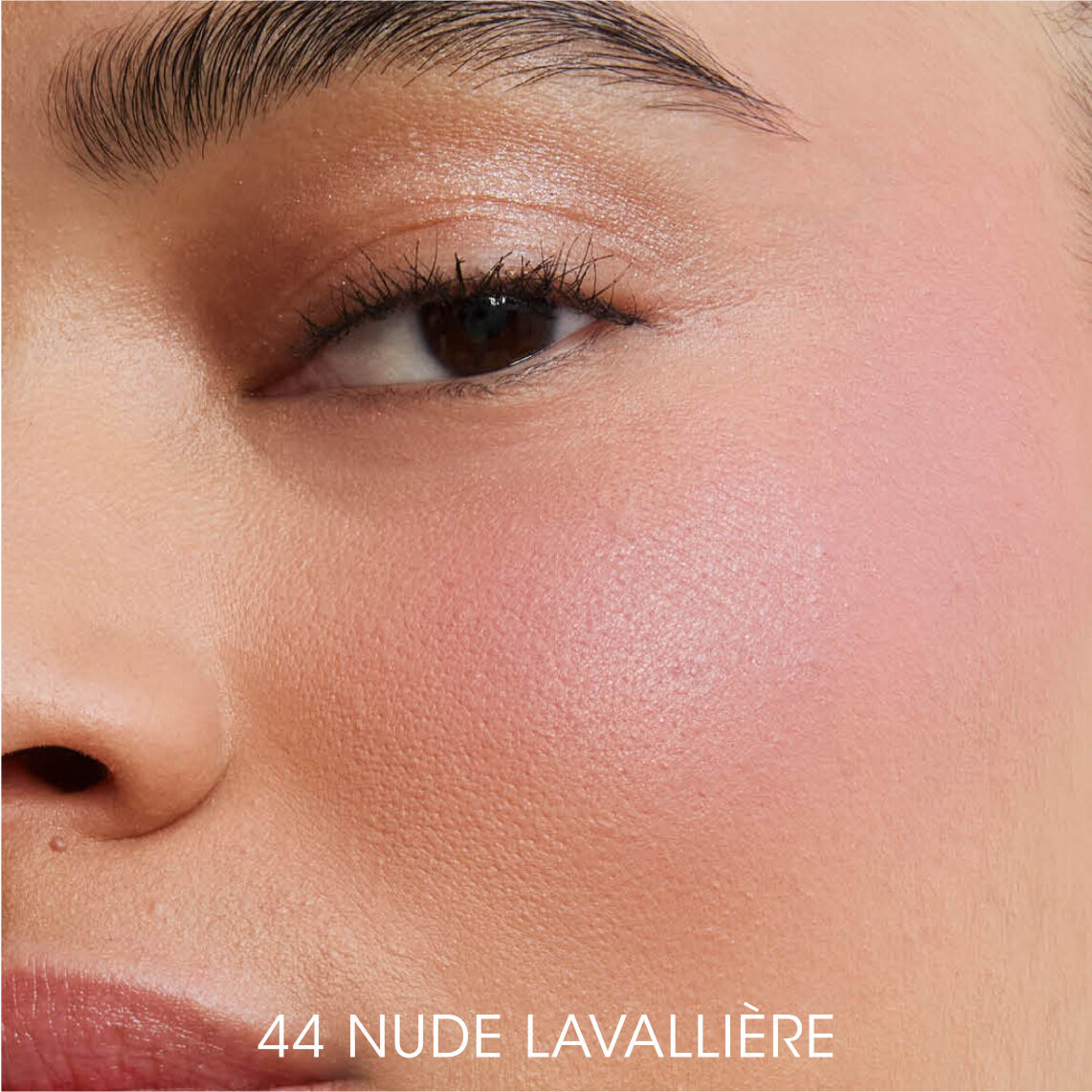 Close-up of model wearing YSL Powder Blush in shade 44 Nude Lavallière for a soft, matte finish
